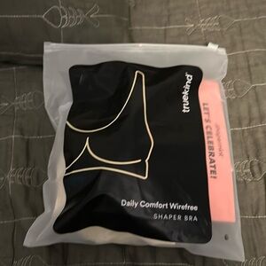 True kind bra size large NEW in bag